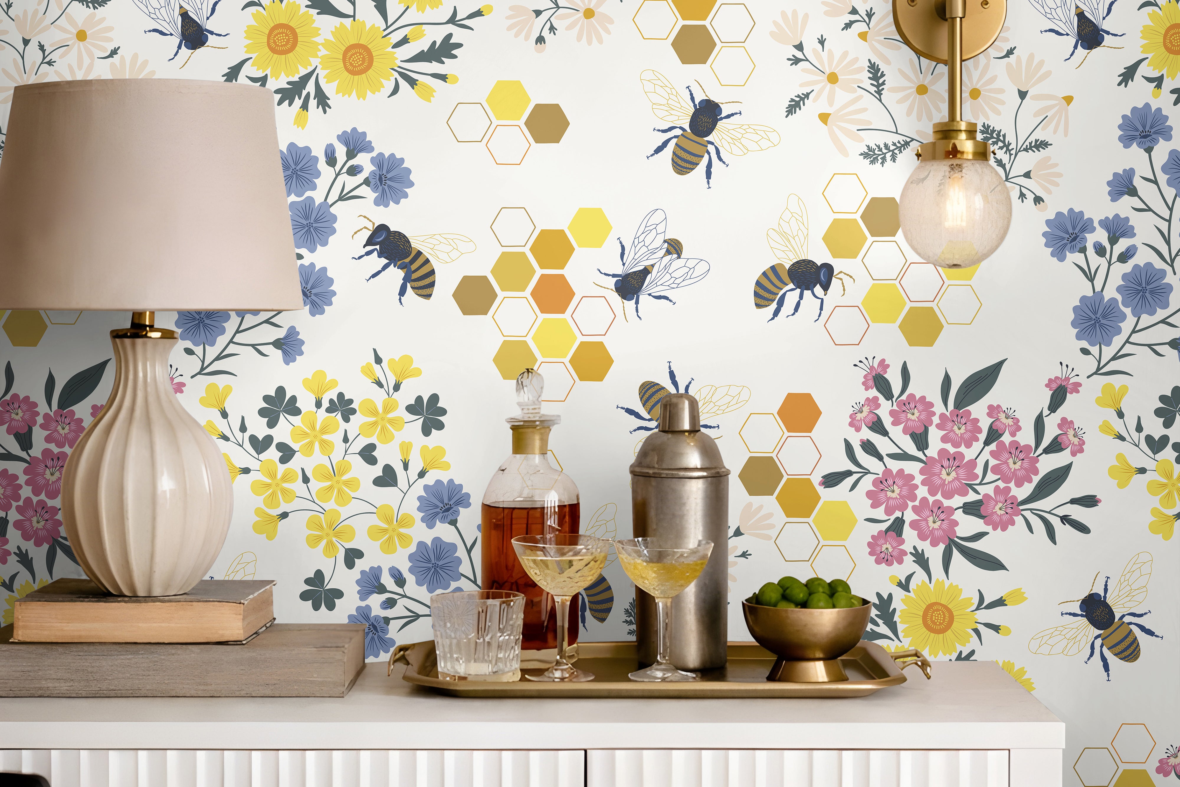 delicate honeybees, vibrant florals in golden yellow, soft pink, and calming blue, and a modern honeycomb accent