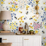 delicate honeybees, vibrant florals in golden yellow, soft pink, and calming blue, and a modern honeycomb accent