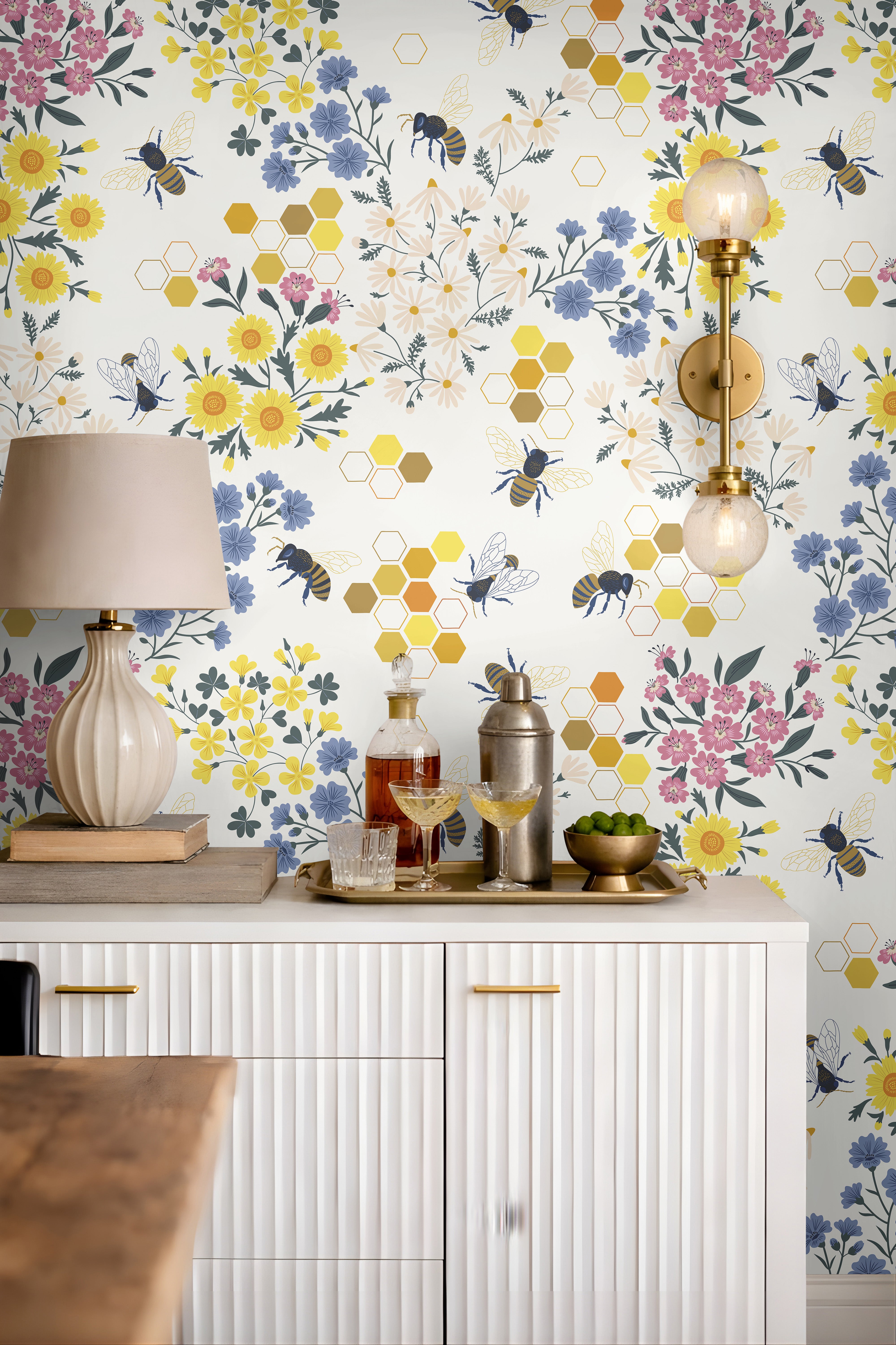 delicate honeybees, vibrant florals in golden yellow, soft pink, and calming blue, and a modern honeycomb accent