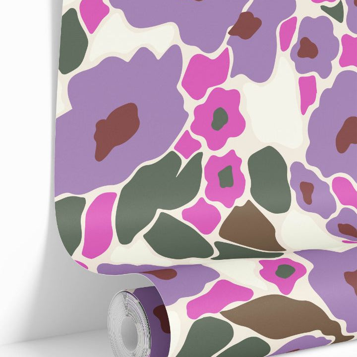 Wallpaper roll of Bloom Society design showing vibrant floral pattern and rich color depth