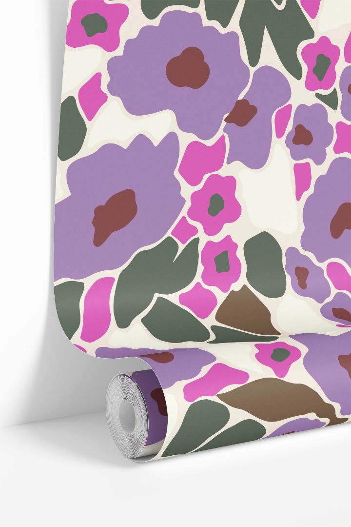 Wallpaper roll of Bloom Society design showing vibrant floral pattern and rich color depth