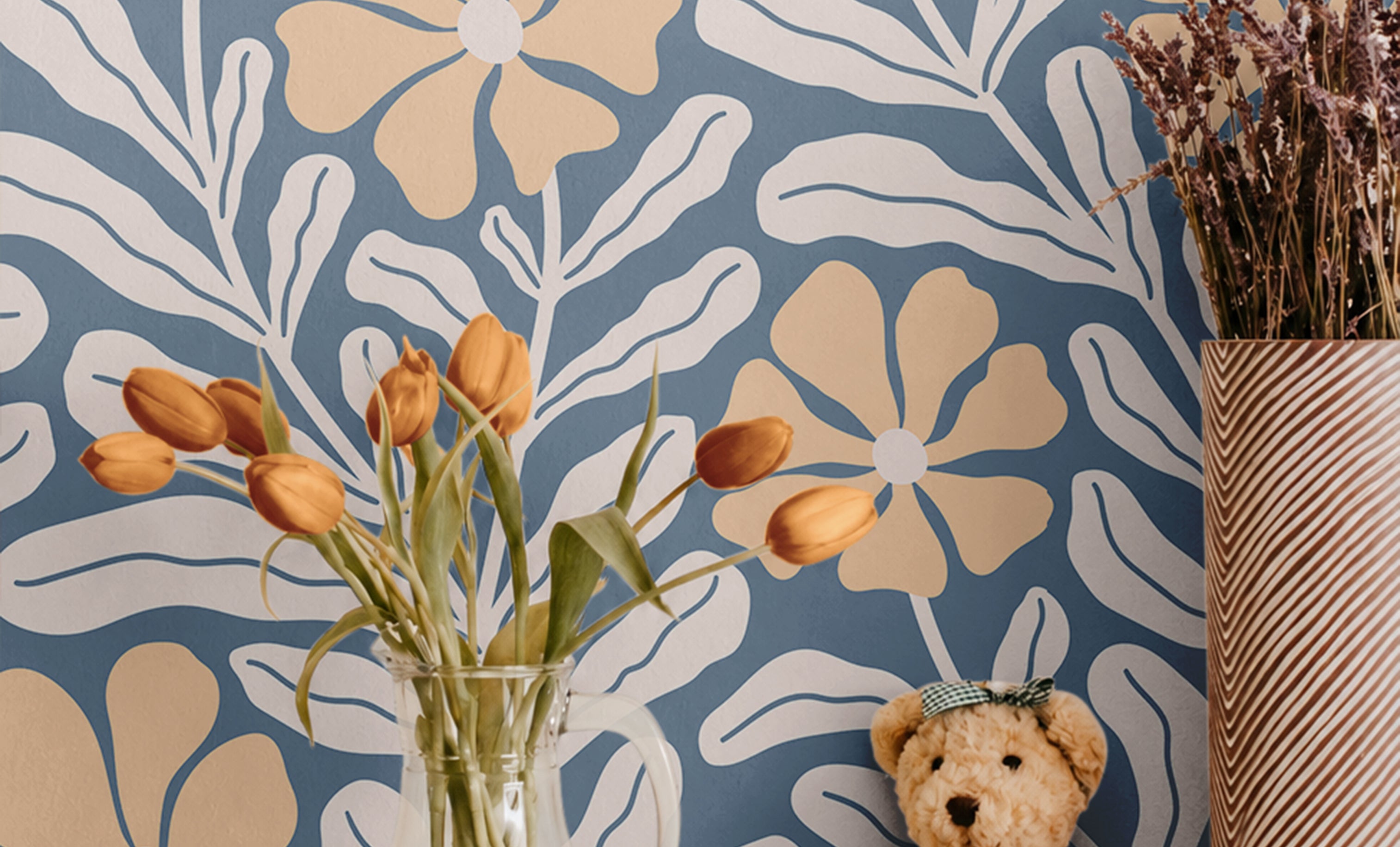 Oversized floral graphics with pastel blue background and orange and white flowers on modern cube shelf in kids room