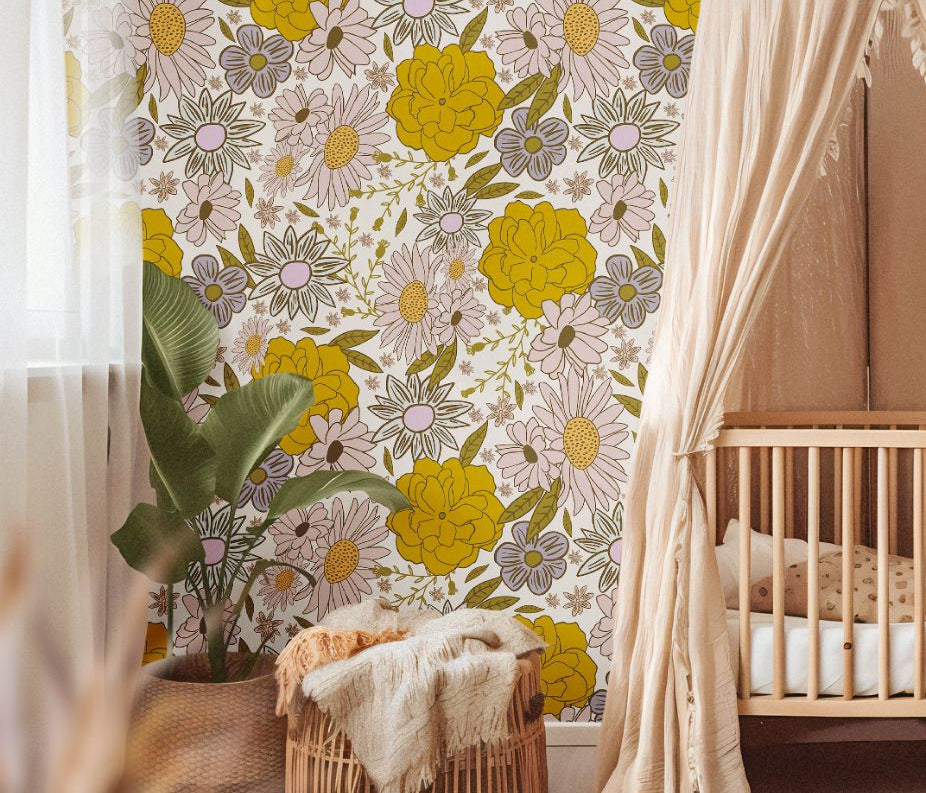 Butterbloom Field Wallpaper in a cozy nursery with warm tones, woven textures, and bohemian decor.
