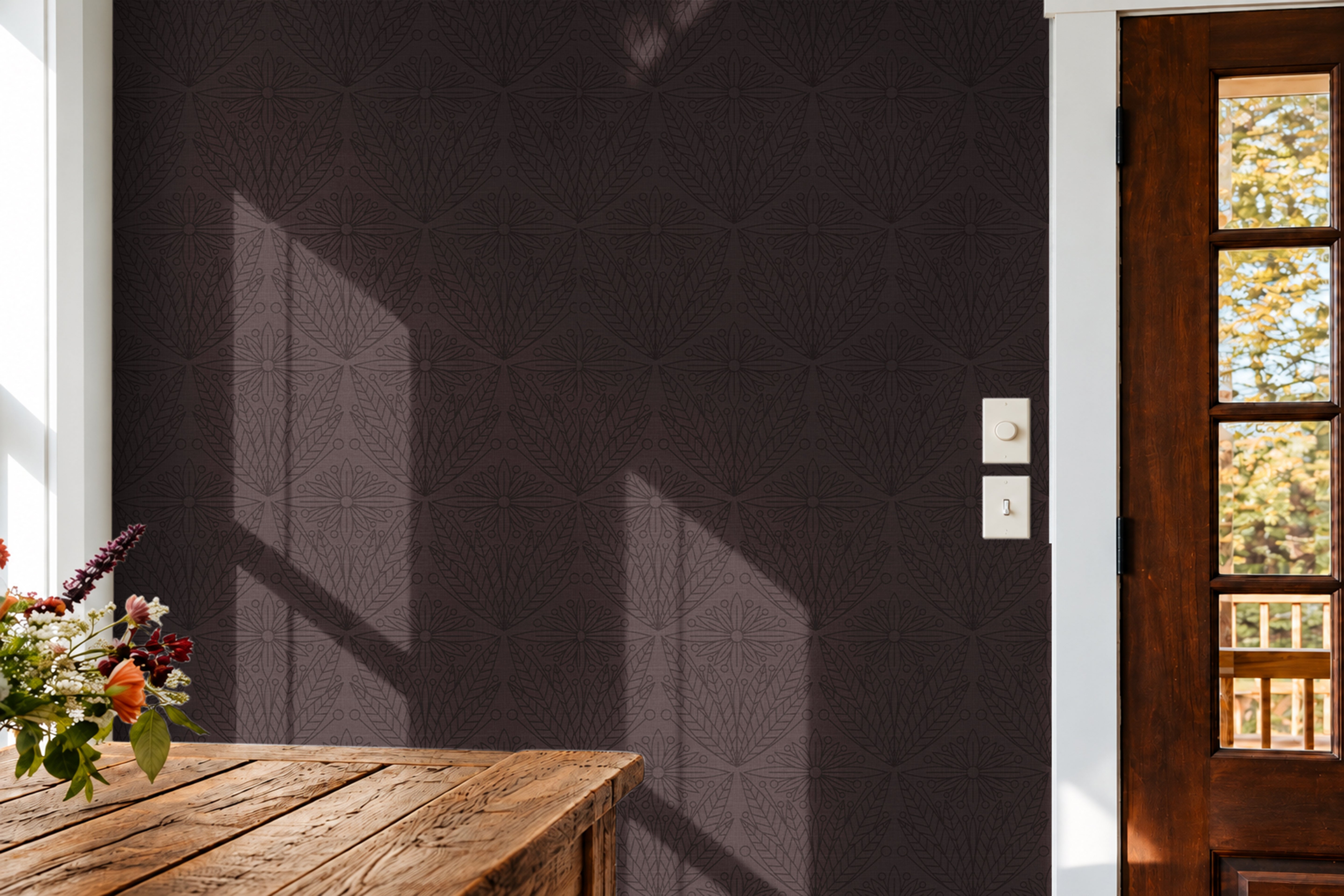 cabernet and gentry 3550 burgundy geometric floral wallpaper in dining room with rustic wood table and door
