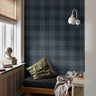 navy charcoal plaid wallpaper pattern in modern bedroom setting with soft lighting