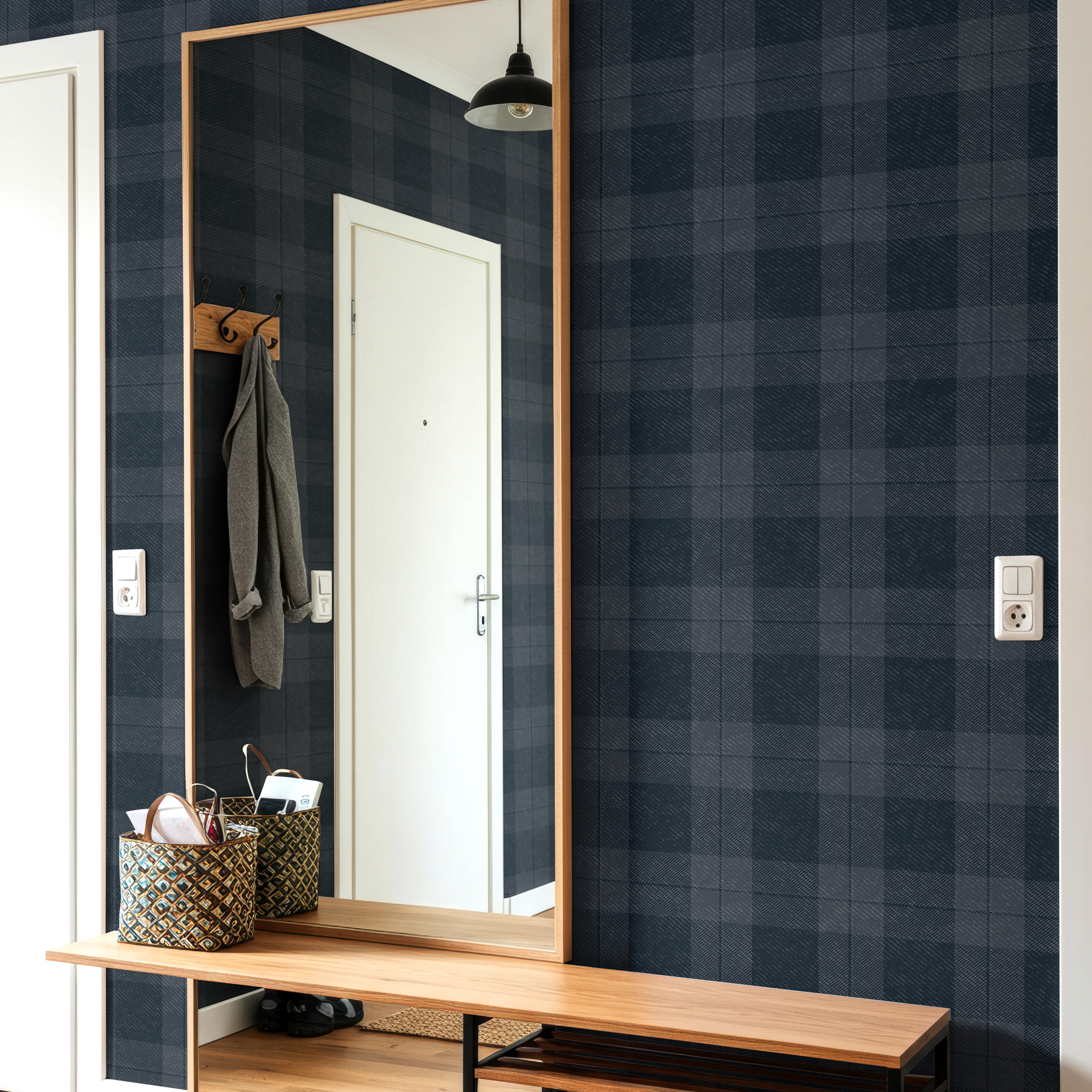 dark plaid wallpaper in entryway with wood bench and mirror modern interior