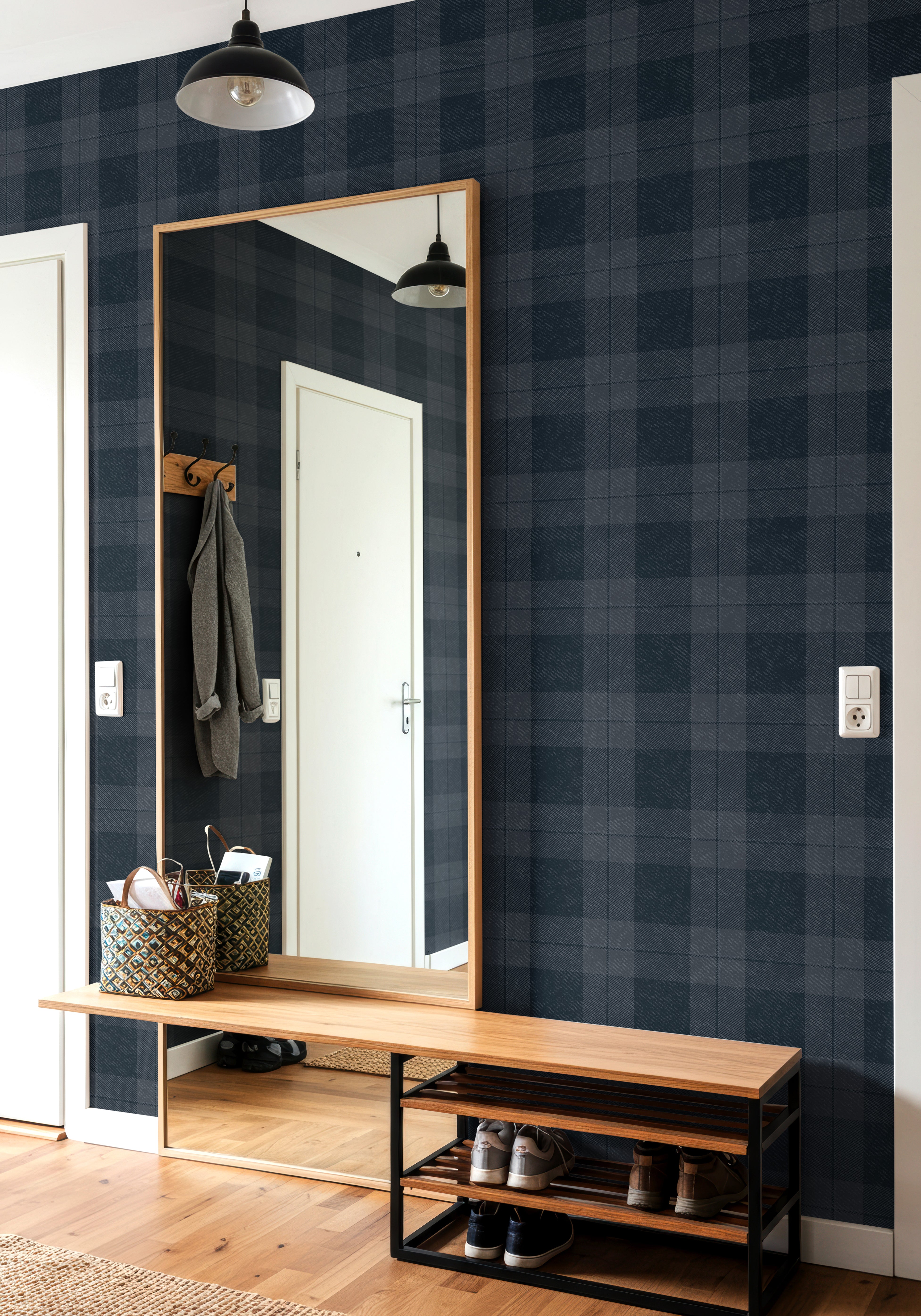 dark plaid wallpaper in entryway with wood bench and mirror modern interior
