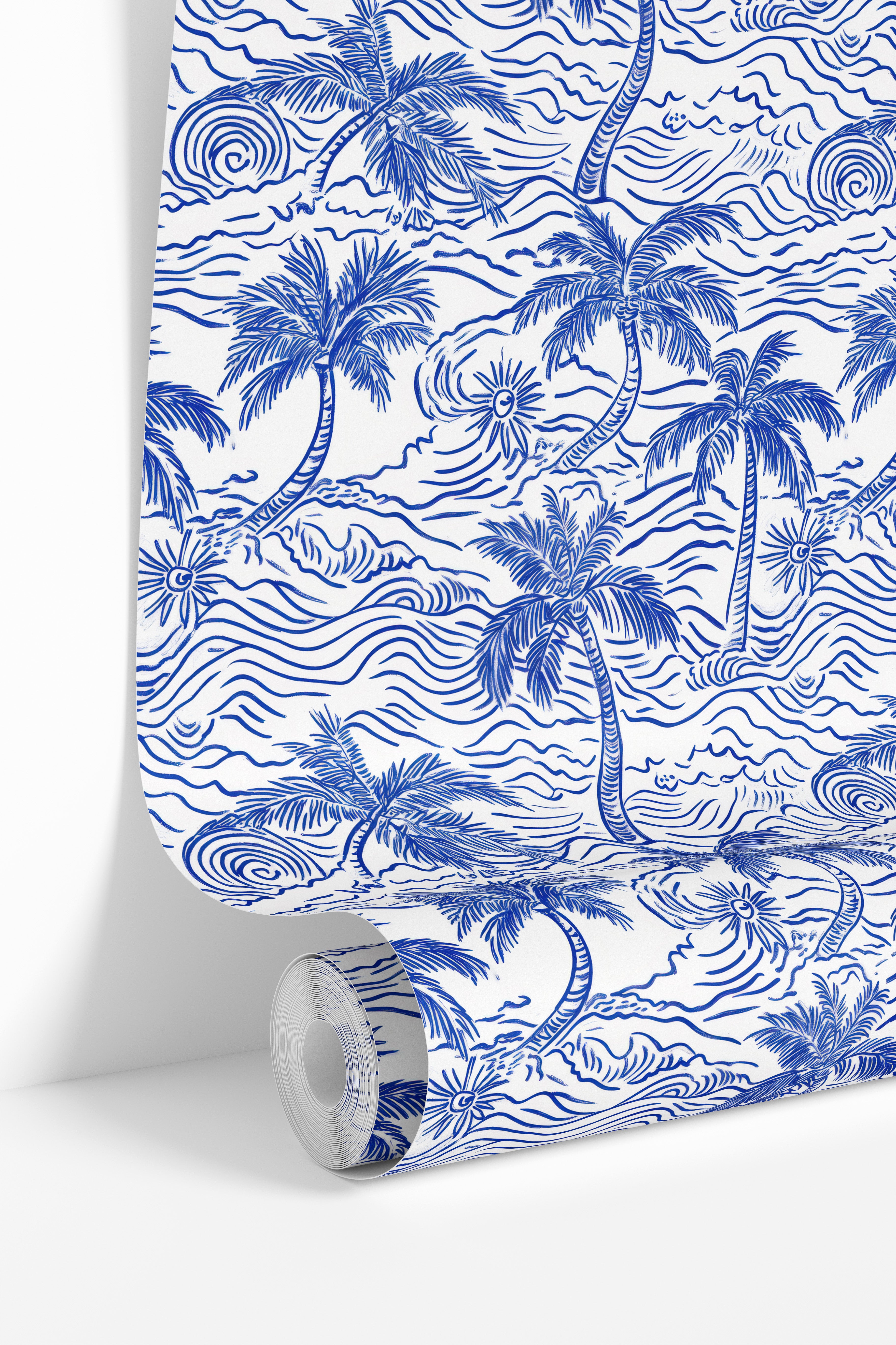 Roll view of Coconut Bay coastal palm wallpaper featuring blue hand drawn palm trees and ocean wave details.