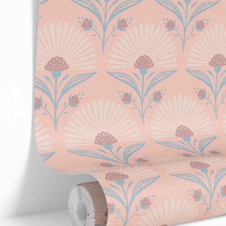 Coral Bloom wallpaper roll featuring coral background with blue and mauve floral pattern by James & Colors
