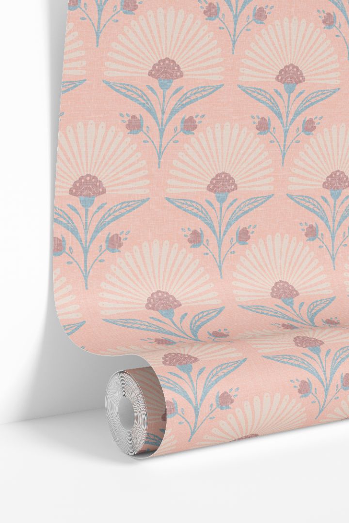 Coral Bloom wallpaper roll featuring coral background with blue and mauve floral pattern by James & Colors