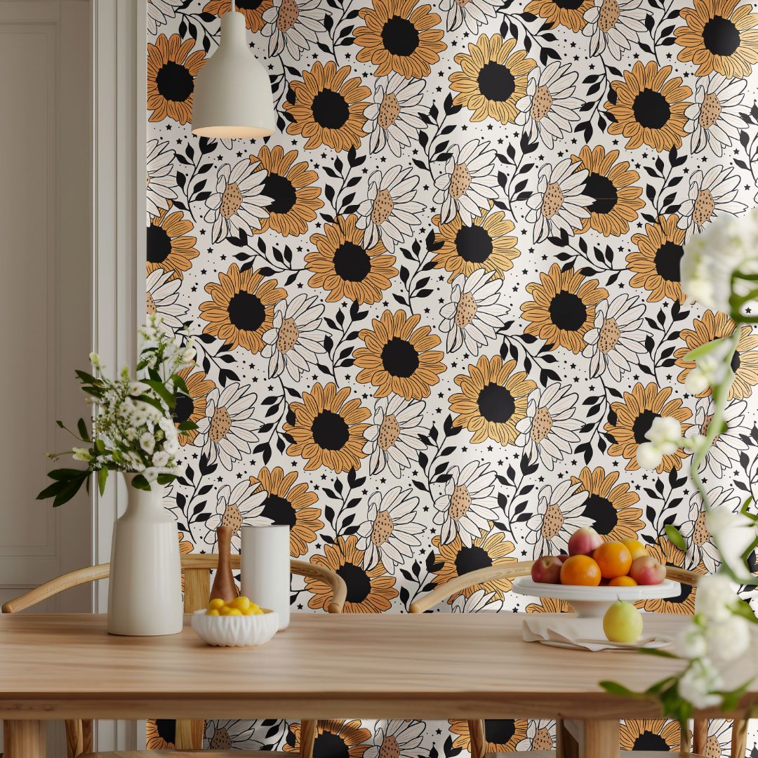 daisy noir sunflower wallpaper with modern black and gold design in bright dining space with wood table