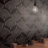 Echo Elegance Art Deco wallpaper creating a dramatic accent wall in a stylish restaurant interior