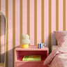 soft pink and neutral stripe wallpaper in bedroom with calm minimal design