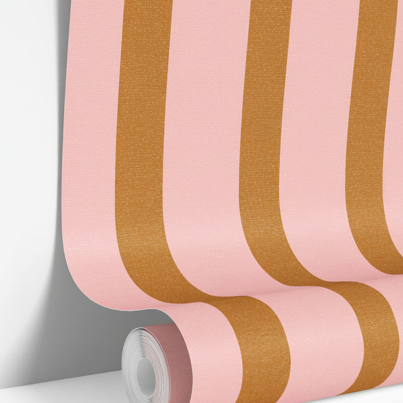 wallpaper roll showing pink and neutral stripe pattern with clean vertical lines