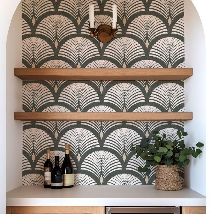 evercroft dark green geometric wallpaper in arched home bar niche with wood shelves and wine bottles