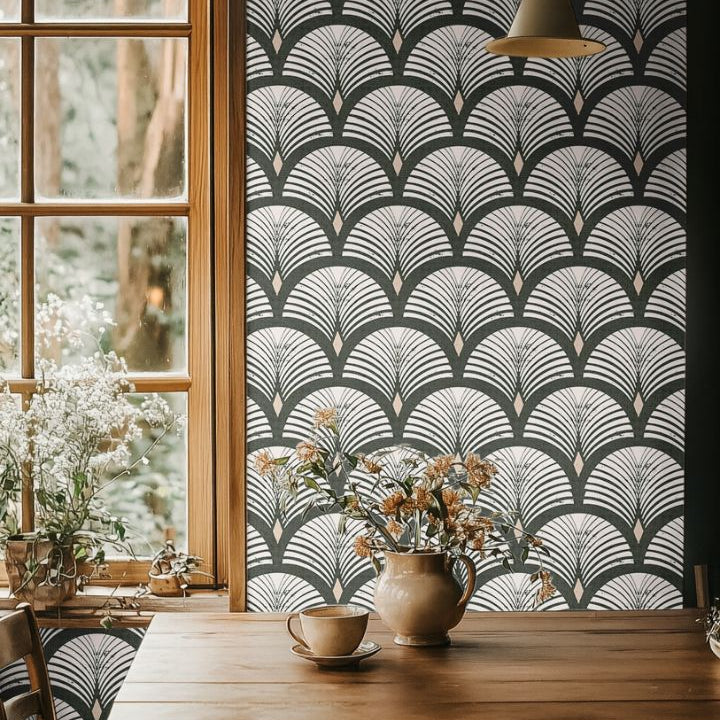 evercroft dark green fan wallpaper in moody dining room with wood table pendant light and dried flowers