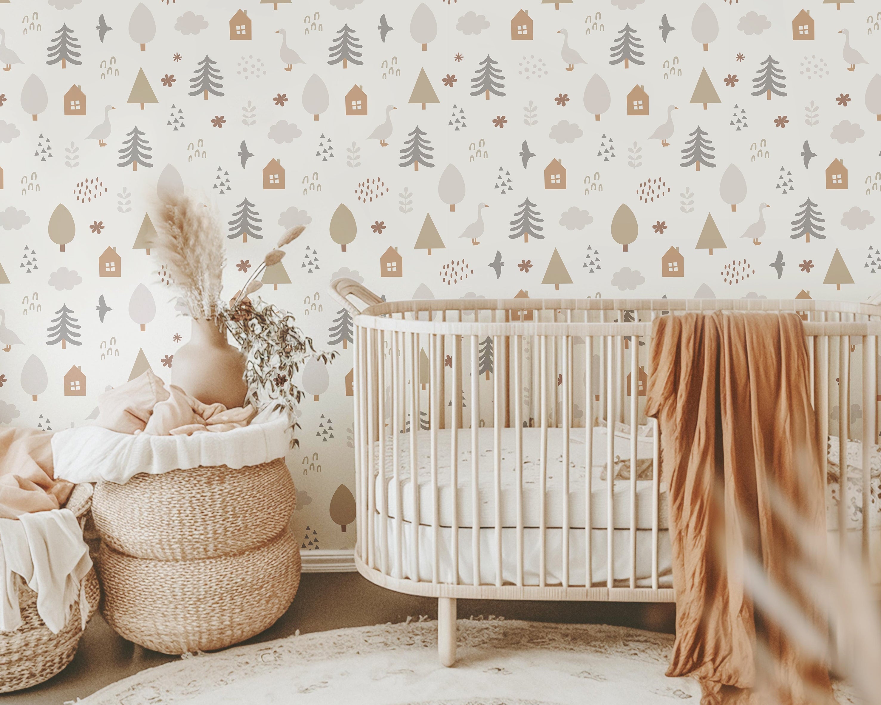 Storybook woodland nursery wallpaper featuring geese, pine trees, and cozy neutral tones in a children's bedroom.