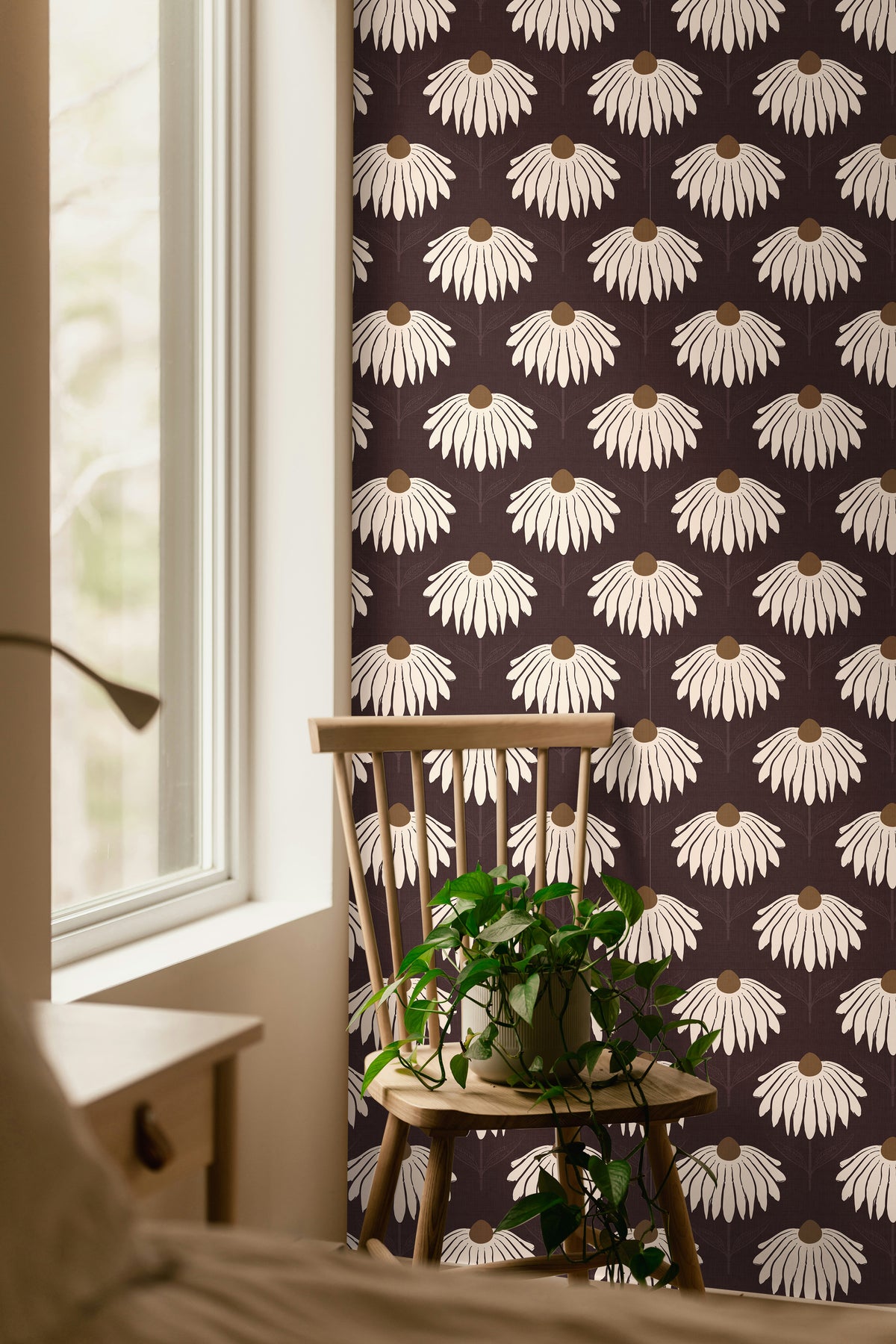 garnet crown 3543 cream coneflower wallpaper in reading nook with wood chair green plant and window