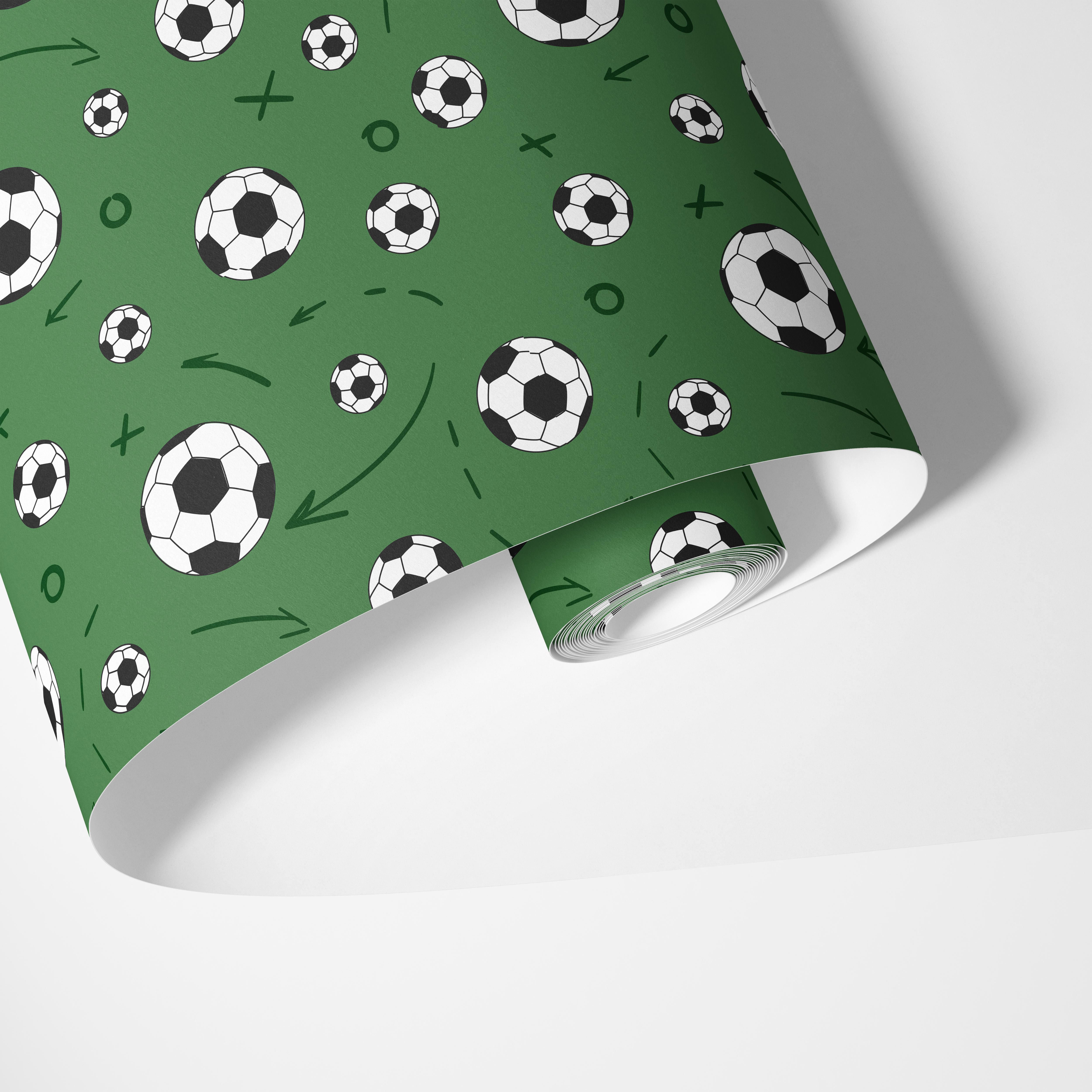green contact paper with black and white soccer balls