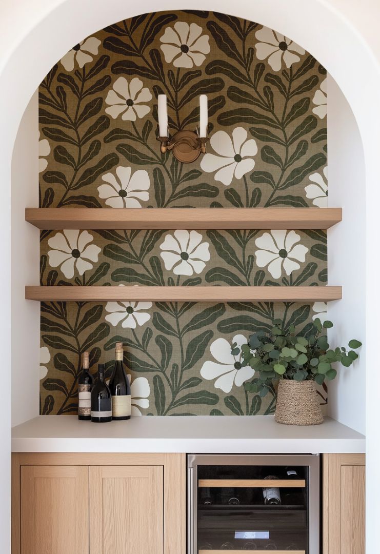 greenwell olive floral wallpaper in living room with natural light and oak furniture – modern organic wall design – james & colors