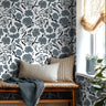 modern bedroom with blue gray floral wallpaper and soft neutral decor