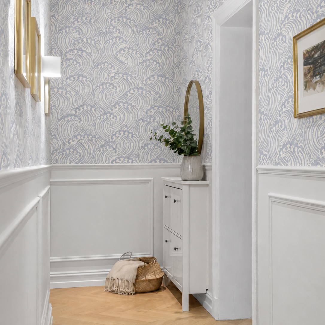 muted blue wave wallpaper above white shiplap paneling in white modern interior