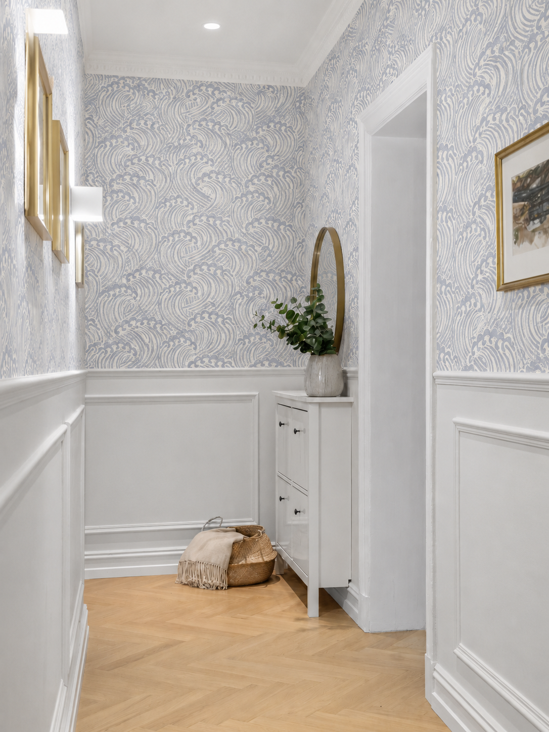 muted blue wave wallpaper above white shiplap paneling in white modern interior