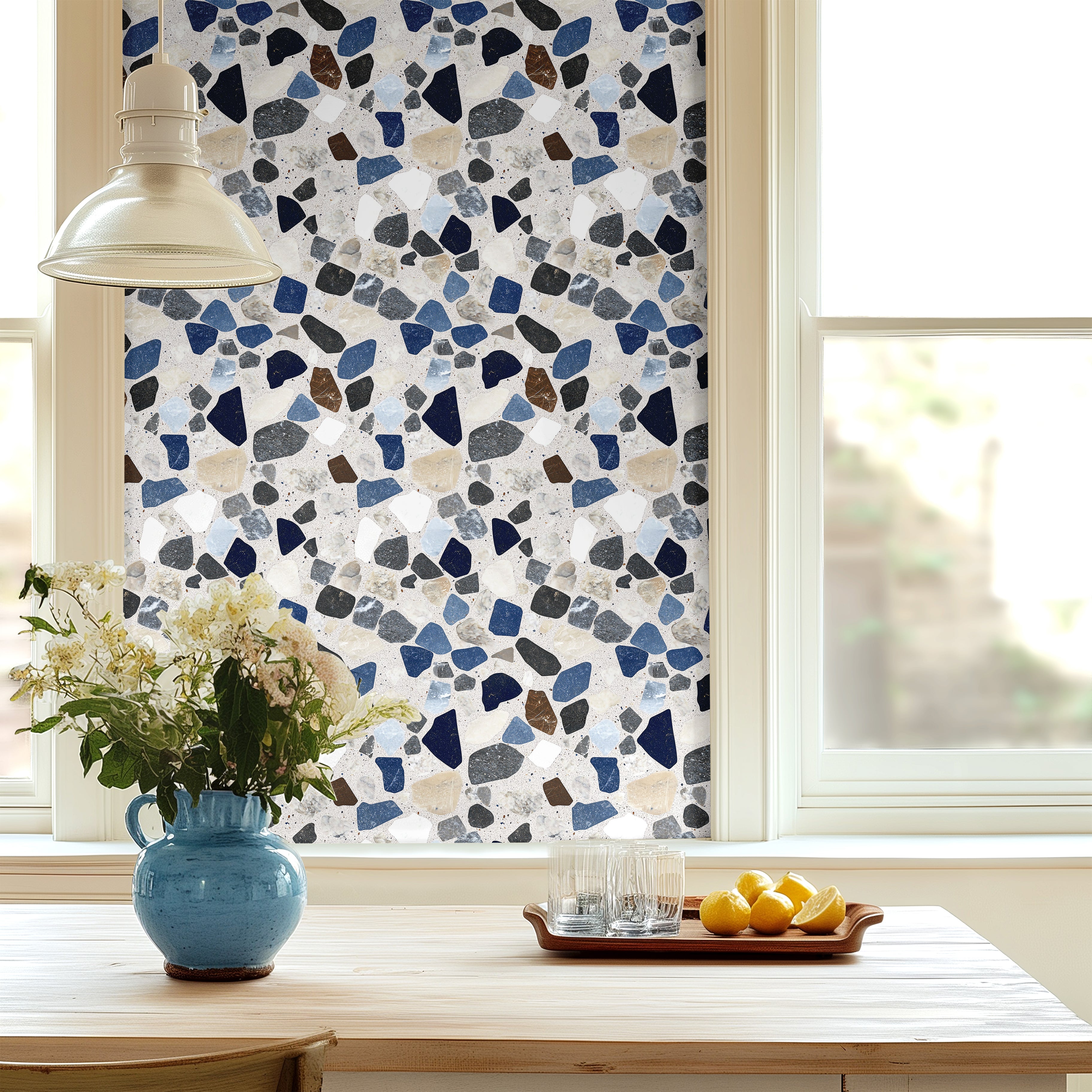 kitchen space with blue terrazzo wallpaper and natural light interior styling