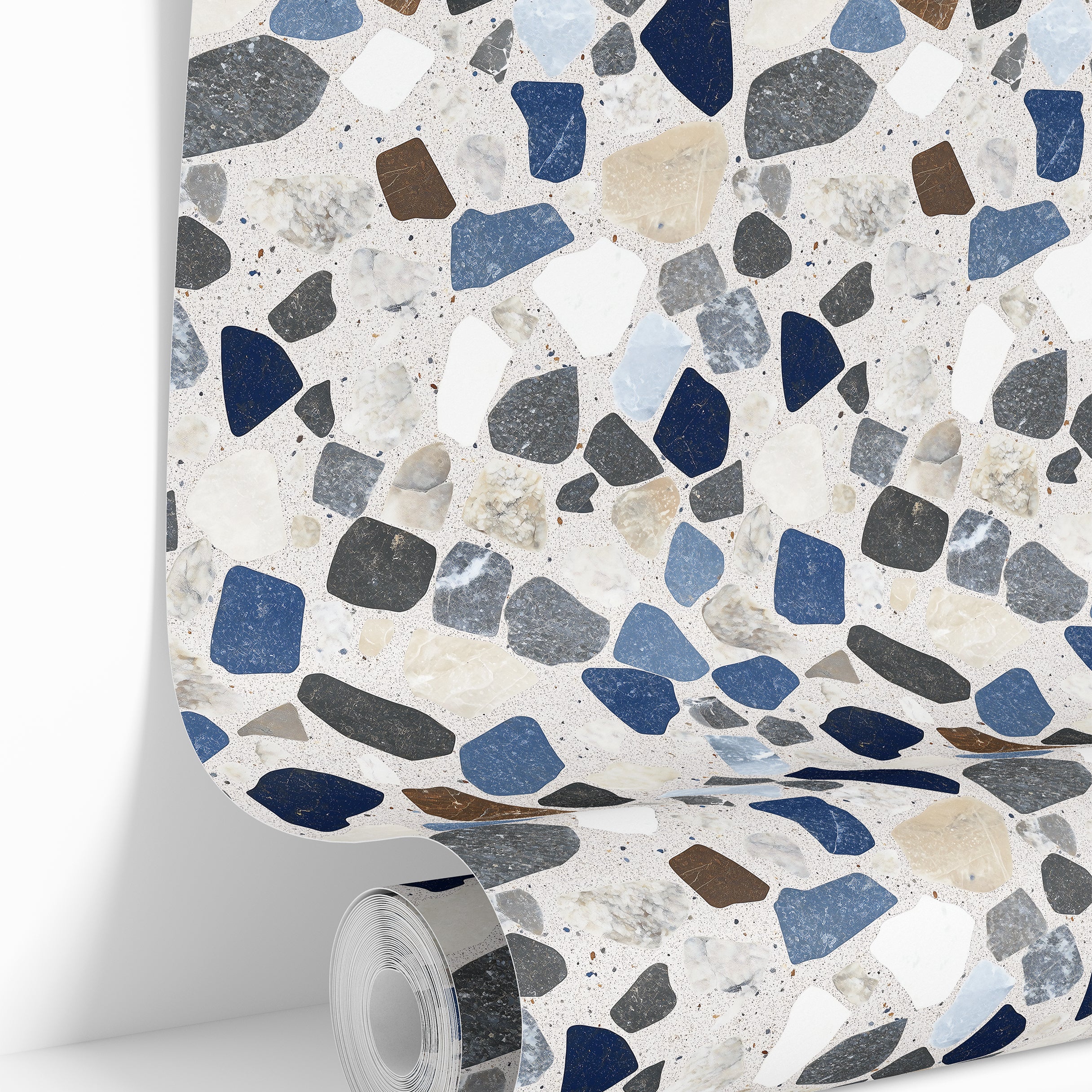 wallpaper roll showing blue terrazzo stone mosaic pattern for accent walls