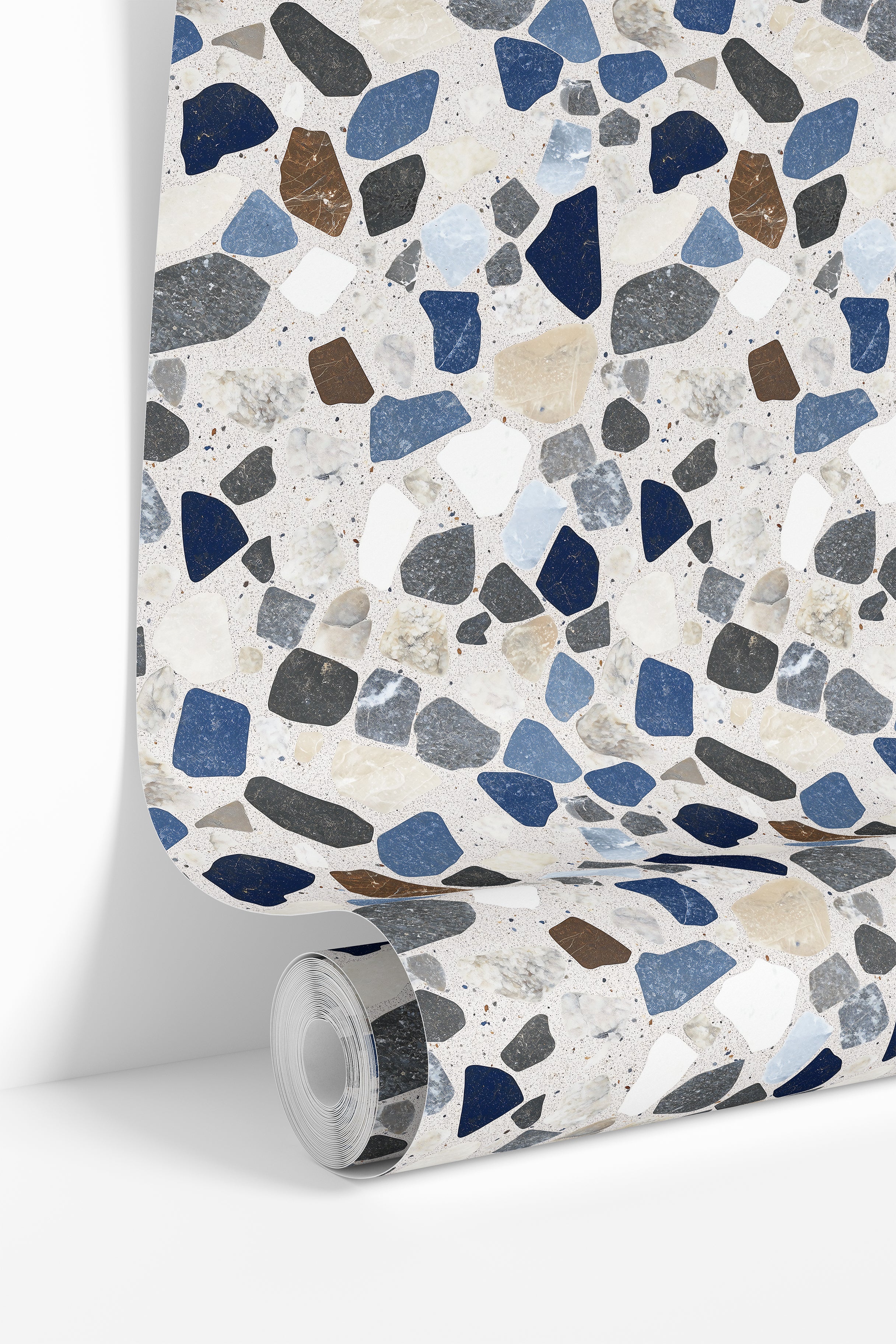 wallpaper roll showing blue terrazzo stone mosaic pattern for accent walls