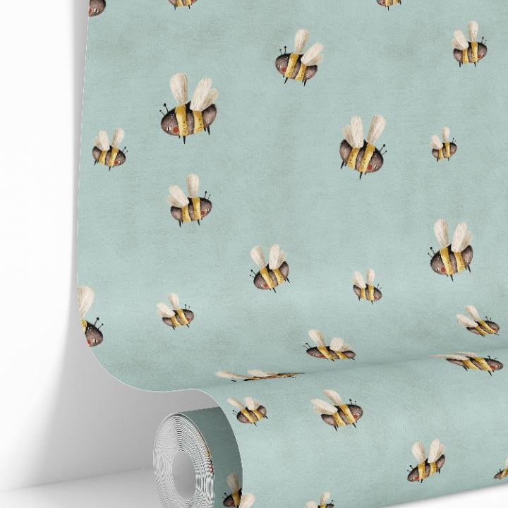 honey drift wallpaper roll showing whimsical bees on teal background