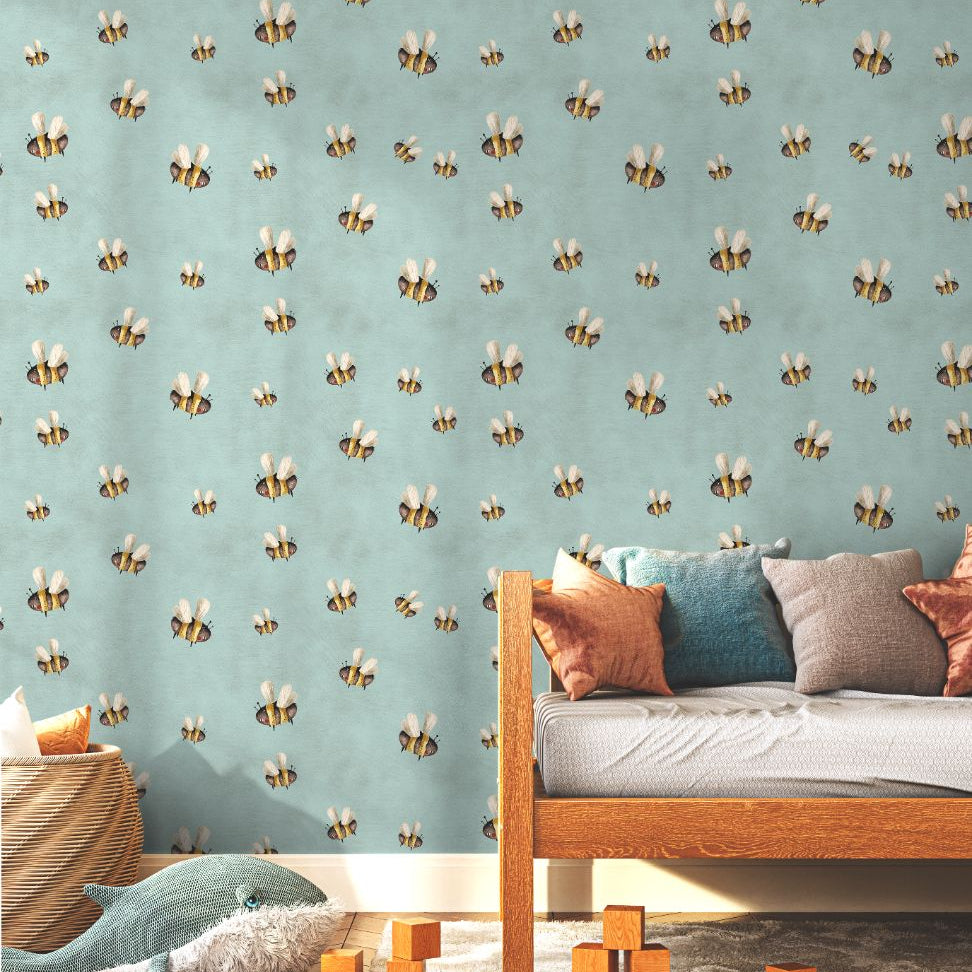 honey drift wallpaper with whimsical bees on teal background in children’s bedroom