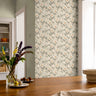 cottage-inspired floral wallpaper with soft sage tones and delicate meadow flowers