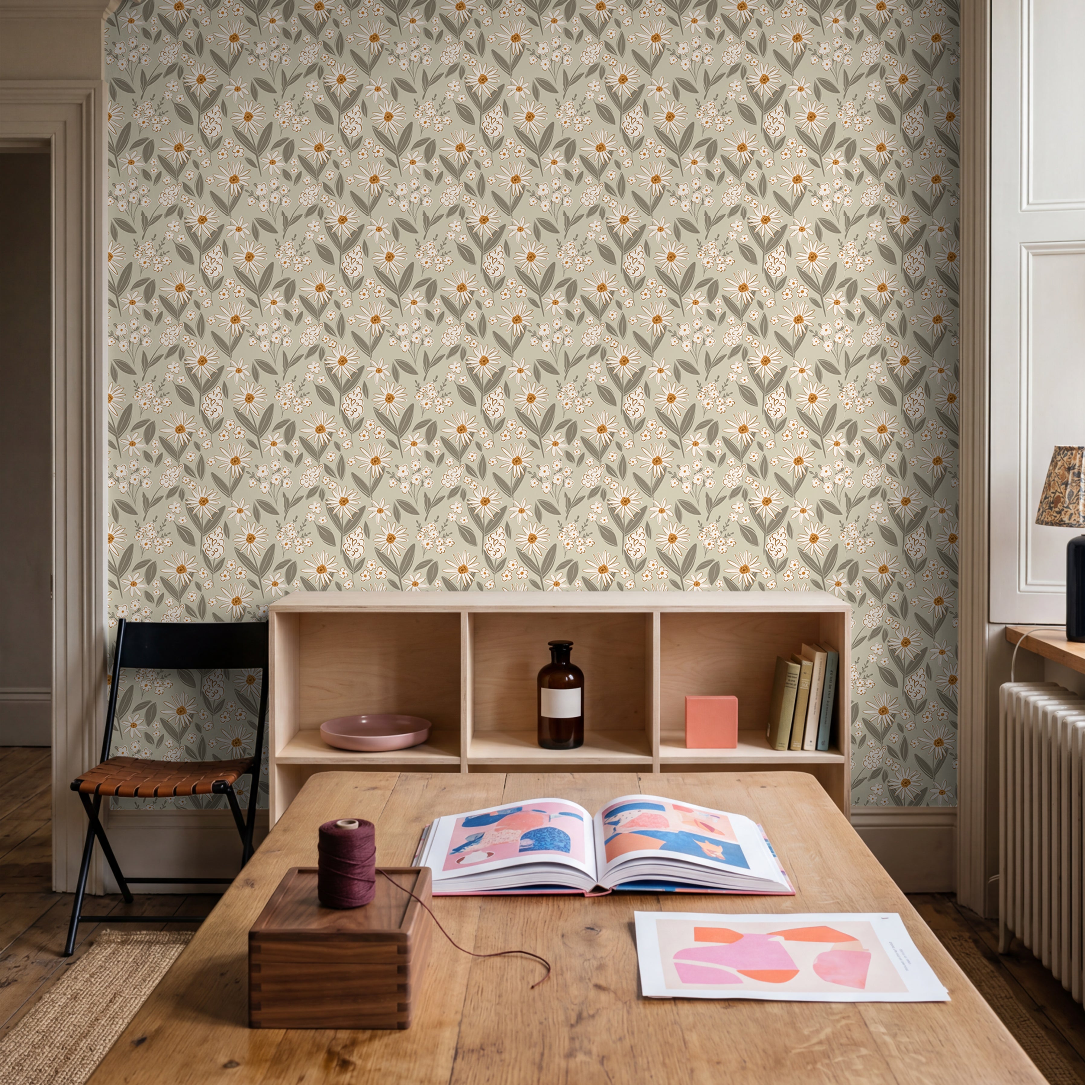botanical floral wallpaper with muted sage and honey tones in organic modern kitchen

