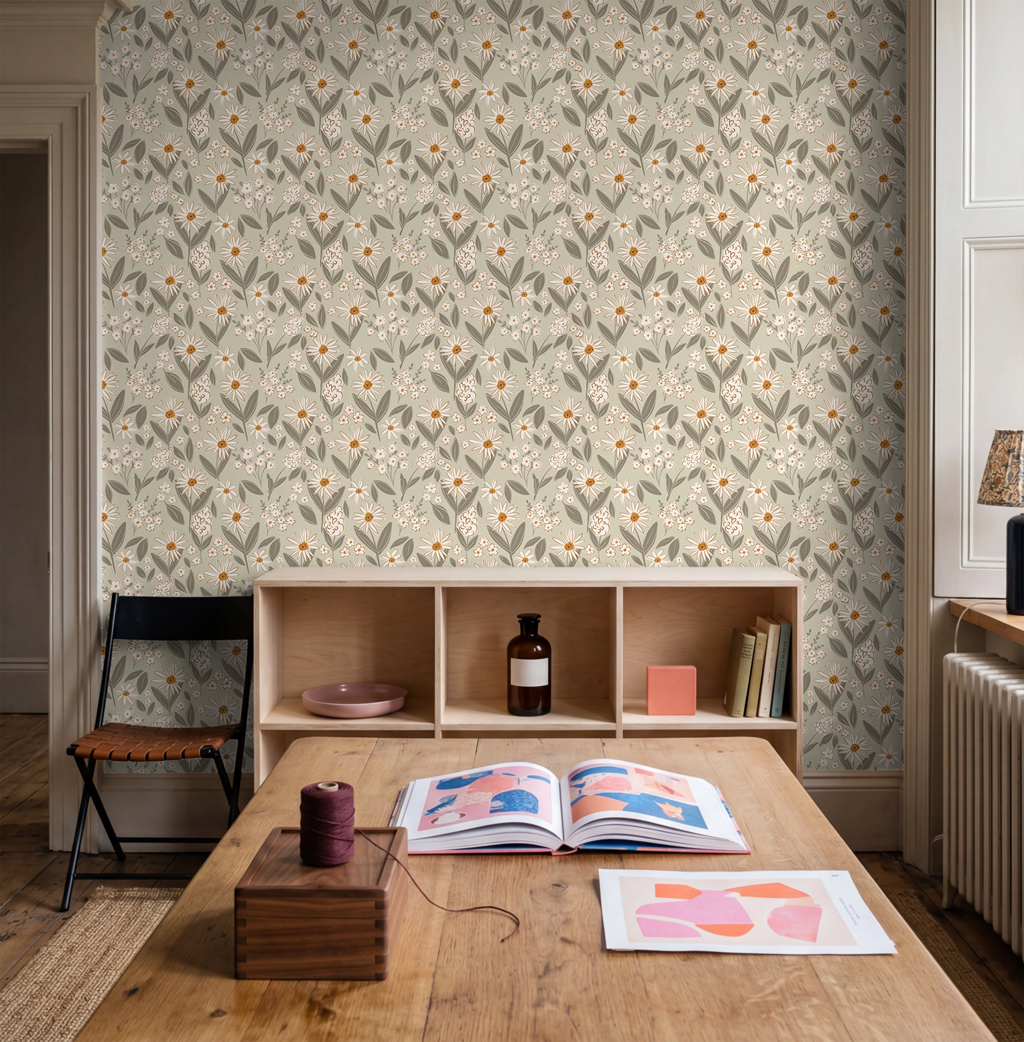 botanical floral wallpaper with muted sage and honey tones in organic modern kitchen

