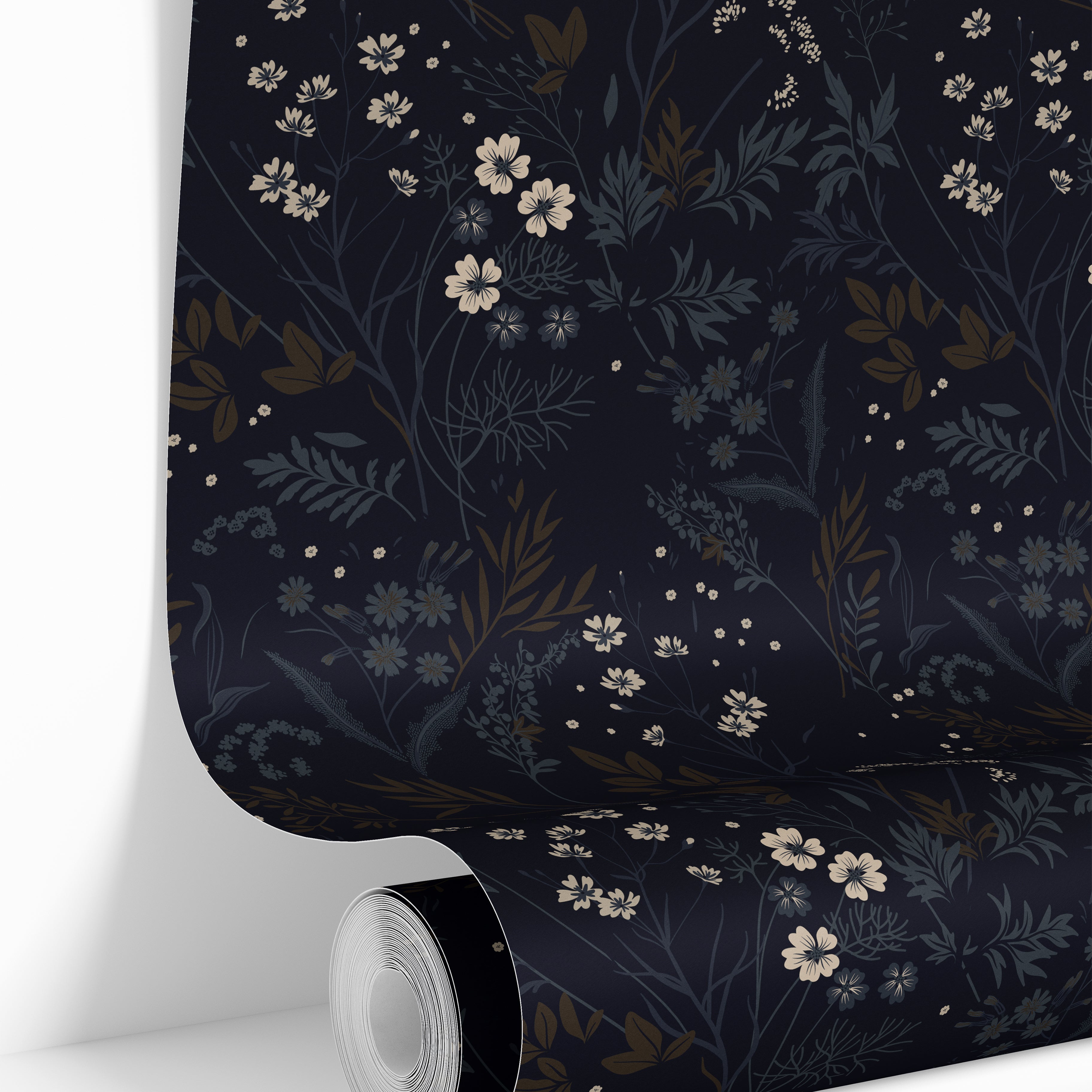 close view of ink and elderflower 3552 black floral wallpaper partly unrolled, showing cream flowers and blue gray foliage