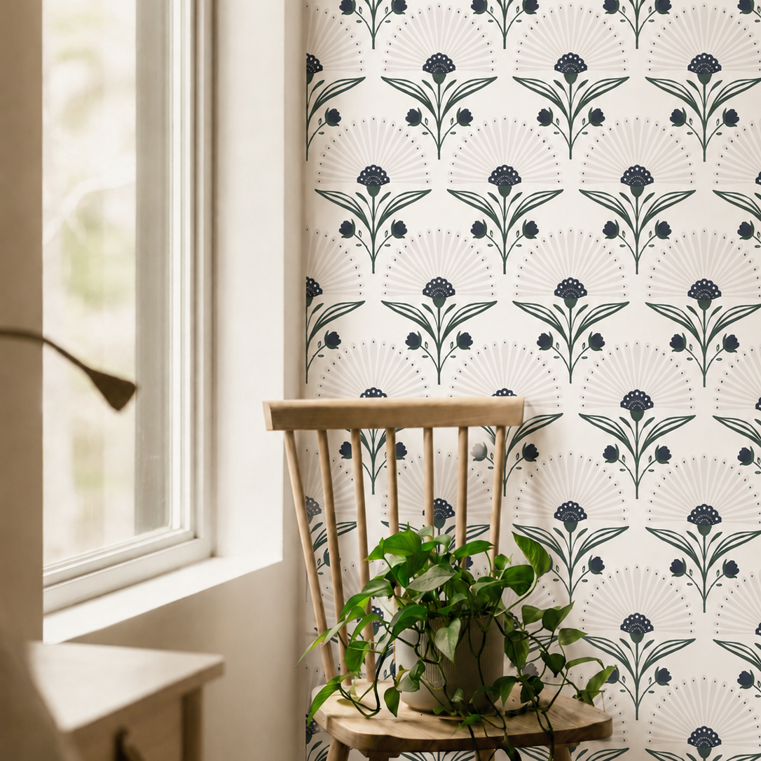 indigo and green art deco floral wallpaper beside window with wood chair and trailing plant