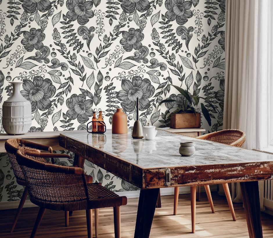 Inkwell Botanica black floral wallpaper in a modern dining room with marble table