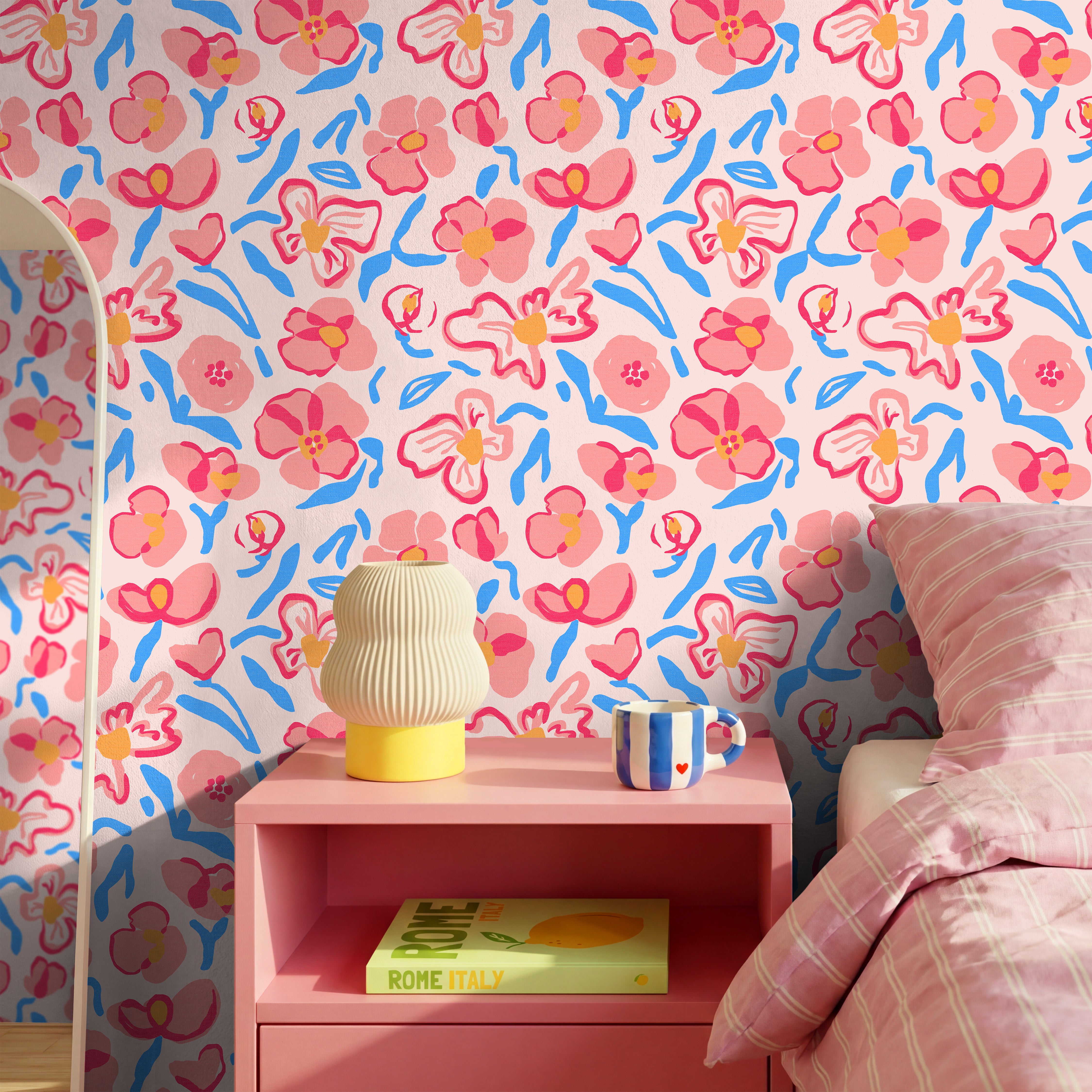 pink and blue floral wallpaper in girls bedroom with playful artistic blooms