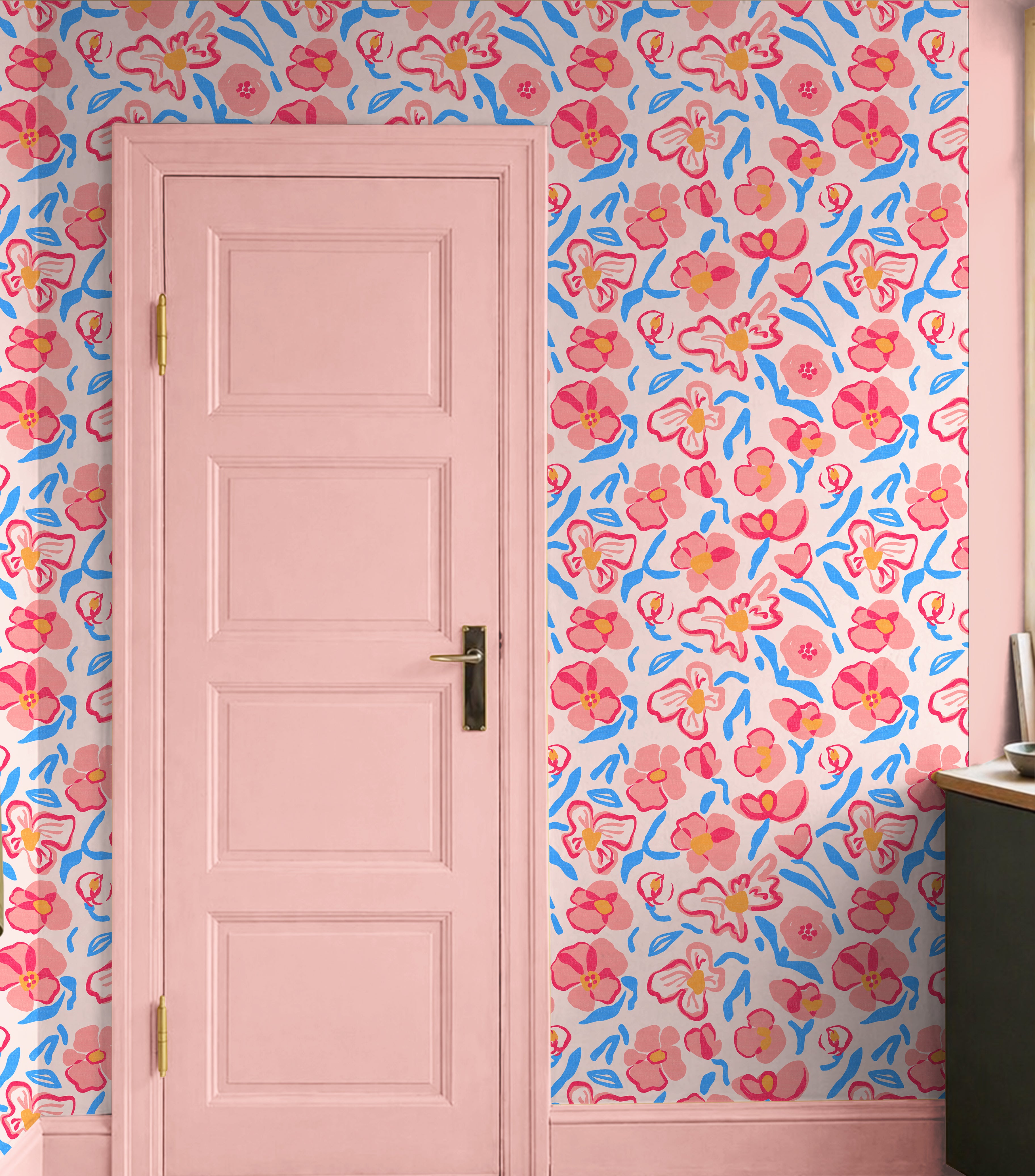 colorful floral wallpaper with pink flowers and blue accents in playful interior