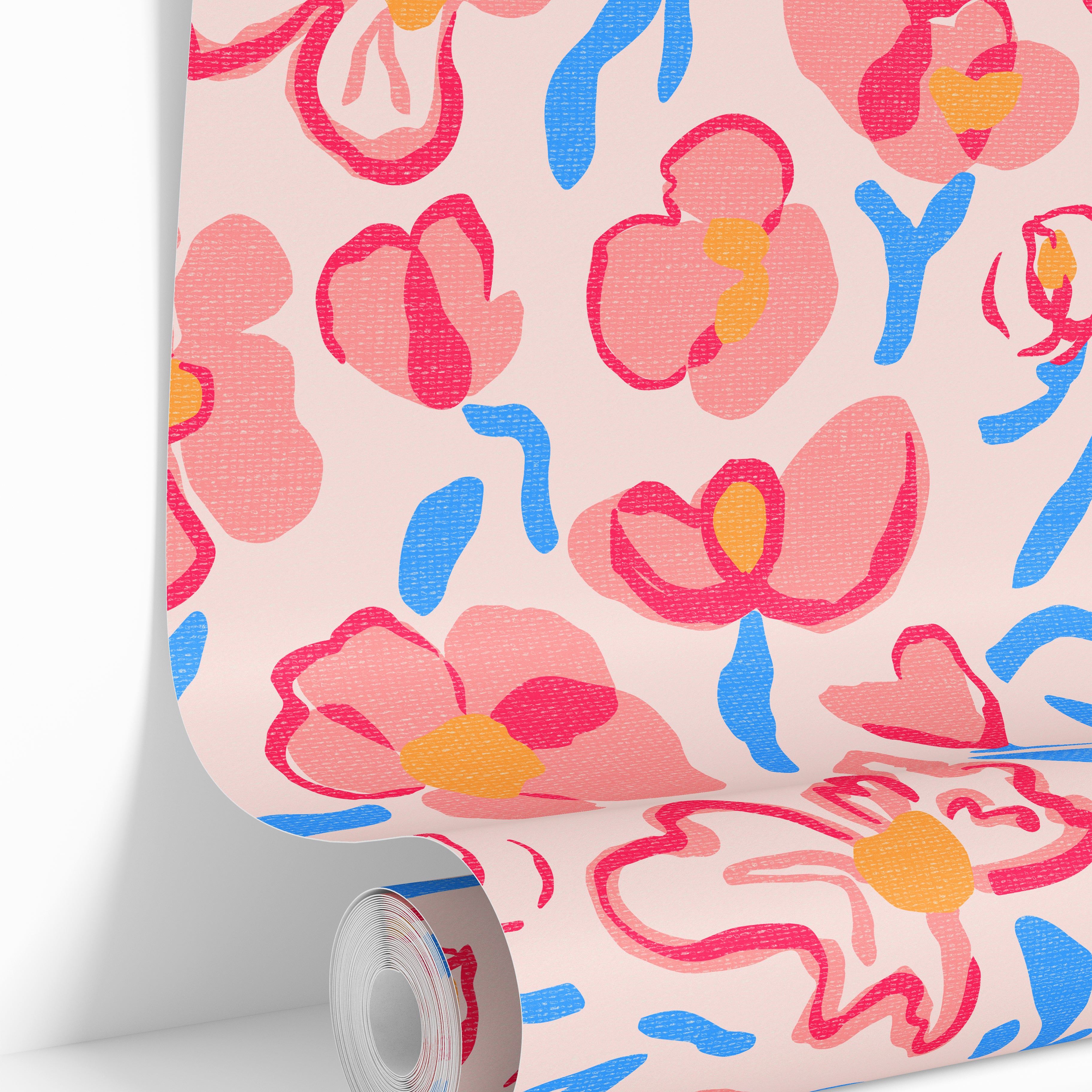 wallpaper roll showing colorful floral pattern with pink flowers and blue accents
