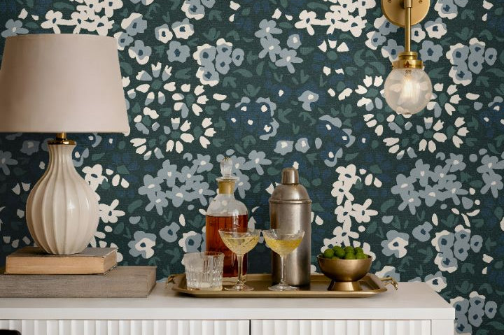 close up of blue green floral wallpaper with calico inspired botanical pattern
