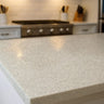 driftstone speckle countertop film with neutral gray speckled stone look on a modern kitchen island