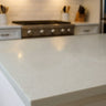 linen terrain countertop film with smooth light gray stone texture on a modern kitchen island