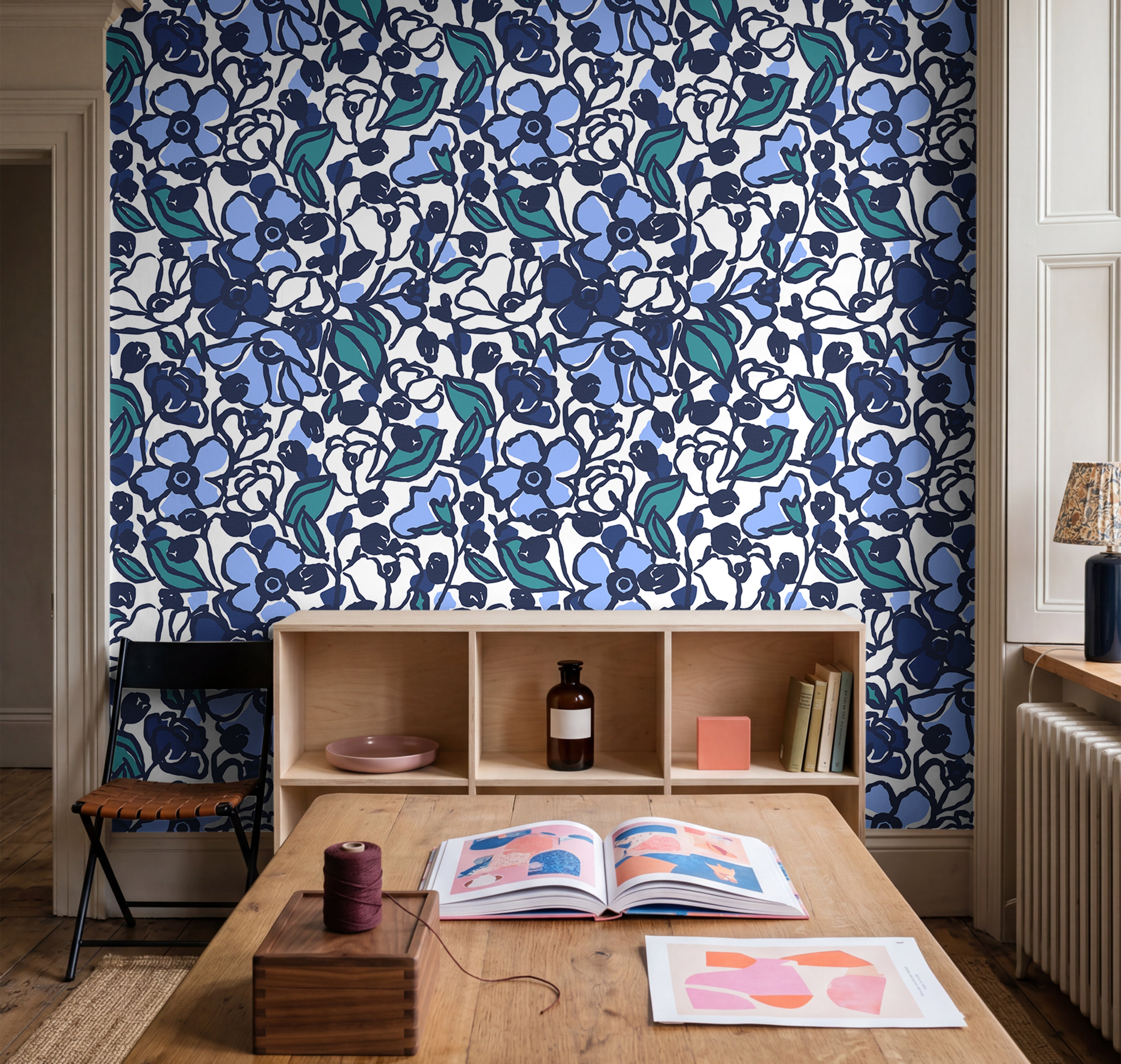 artistic dark floral wallpaper with navy tones in modern dining room

