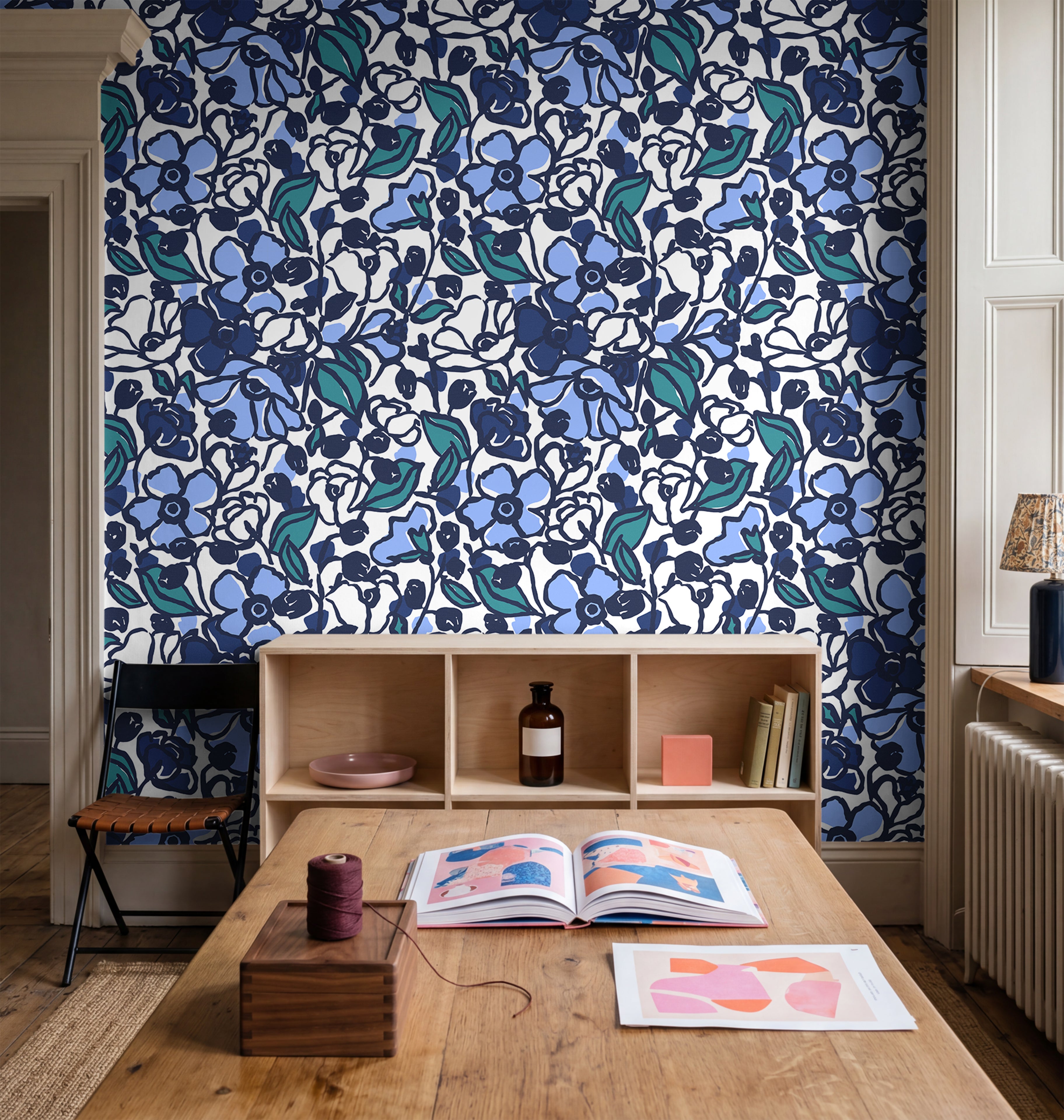  artistic dark floral wallpaper with navy tones in modern dining room
