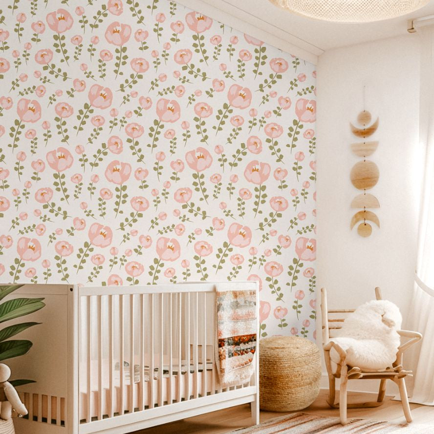 Little Bloom Field nursery wallpaper with soft blush florals and sage green stems creating a calm, neutral baby room