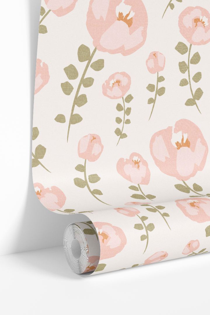Little Bloom Field nursery wallpaper roll featuring soft blush florals and airy sage green stems on a warm neutral background