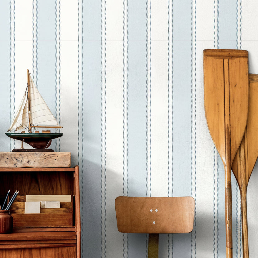 blue and green stripe wallpaper in bedroom with clean tailored pinstripe design