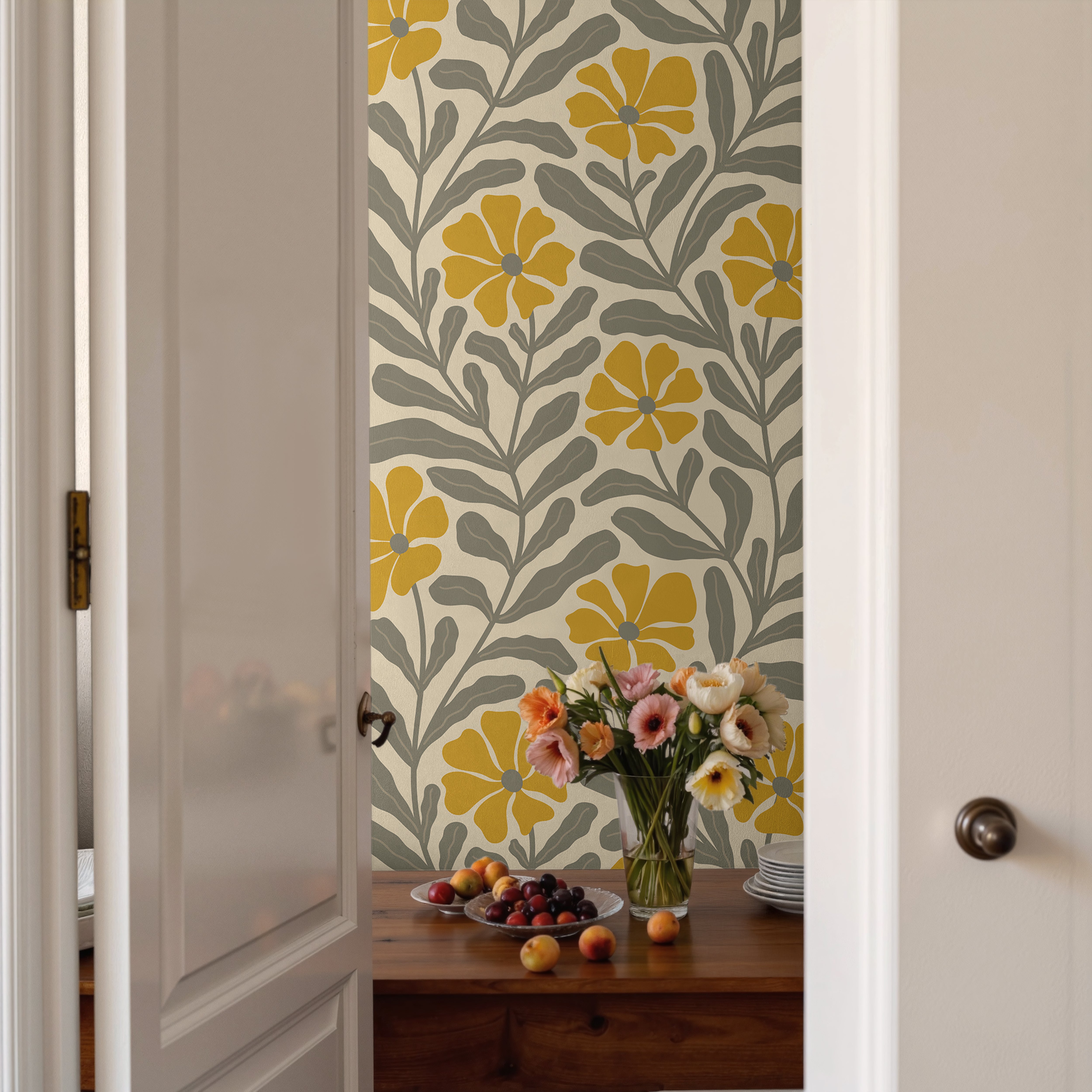 Vintage inspired floral wallpaper with oversized mustard flowers and organic botanical leaves on a cream background.